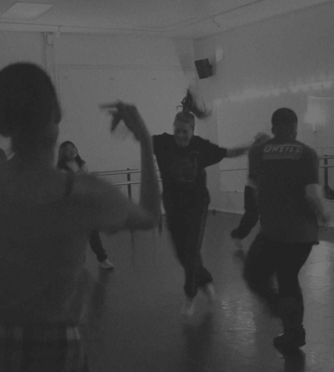 Dancers mid-move during a Cypher class