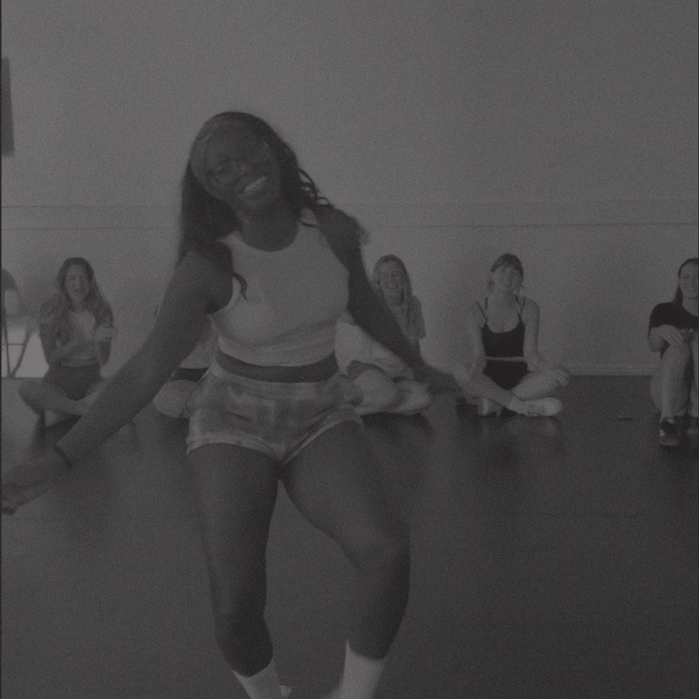 Dancers learning choreography together