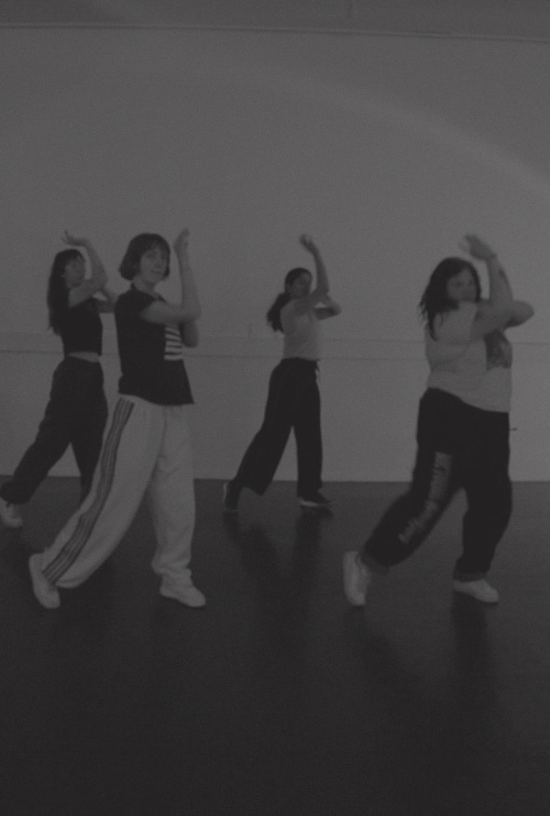 A full class dancing in formation